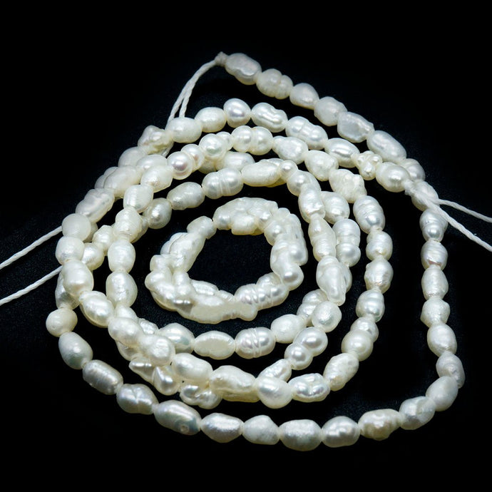 A Grade Natural Cultured Freshwater Pearls - Rice 4-6mm x 2-3mm Creamy White - Affordable Jewellery Supplies