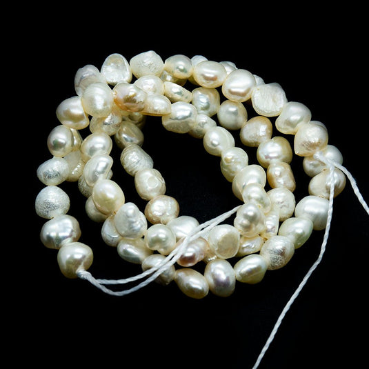 A Grade Natural Cultured Freshwater Pearls - Two-Sides Polished 4-5mm x 3-4mm Creamy White - Affordable Jewellery Supplies