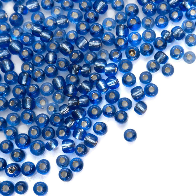 Load image into Gallery viewer, Silver Lined Seed Bead 6/0 Blue - Affordable Jewellery Supplies