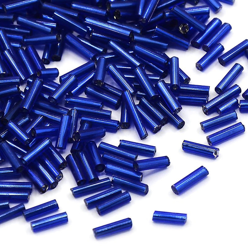 Load image into Gallery viewer, Silver Lined Glass Bugle Bead 6mm x 1.8mm Medium Blue - Affordable Jewellery Supplies
