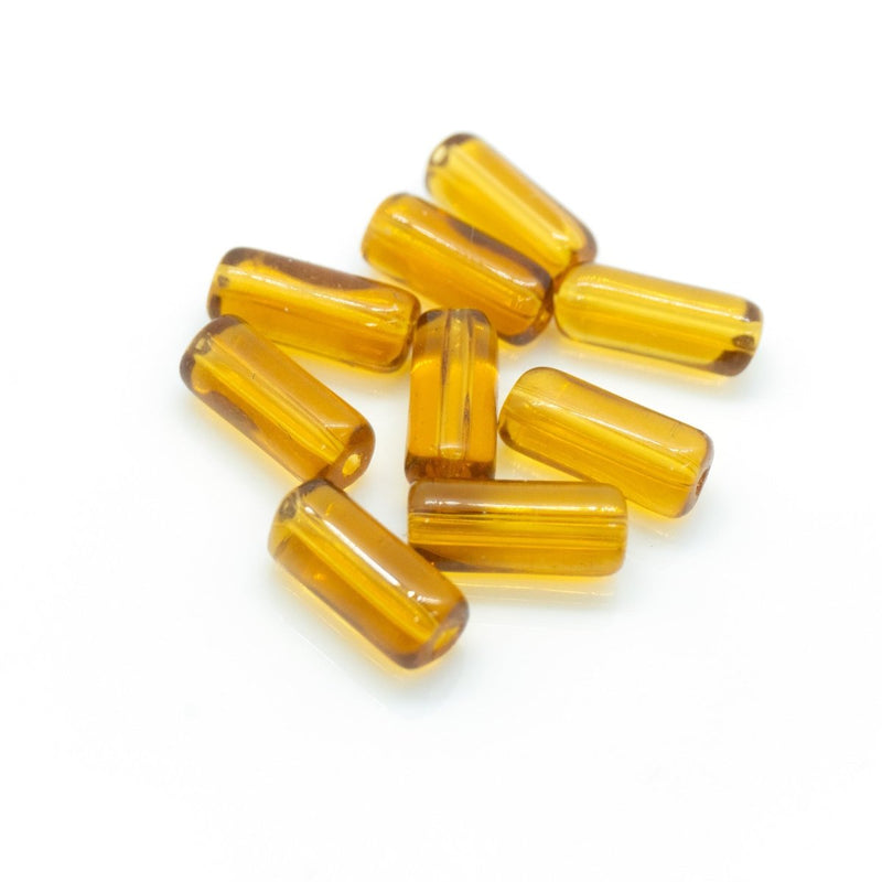 Load image into Gallery viewer, Glass Cylinder 9mm x 4mm Topaz - Affordable Jewellery Supplies

