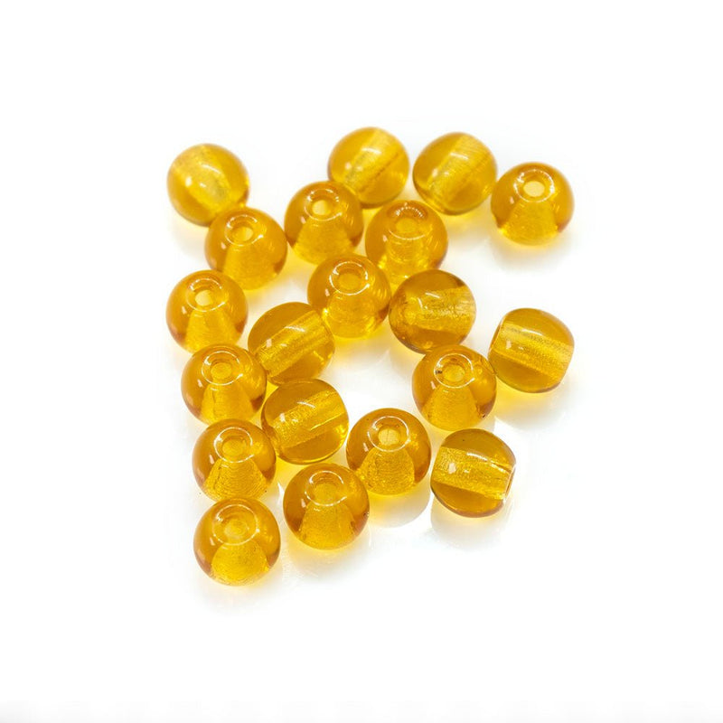Load image into Gallery viewer, Czech Glass Druk Round 4mm Amber - Affordable Jewellery Supplies
