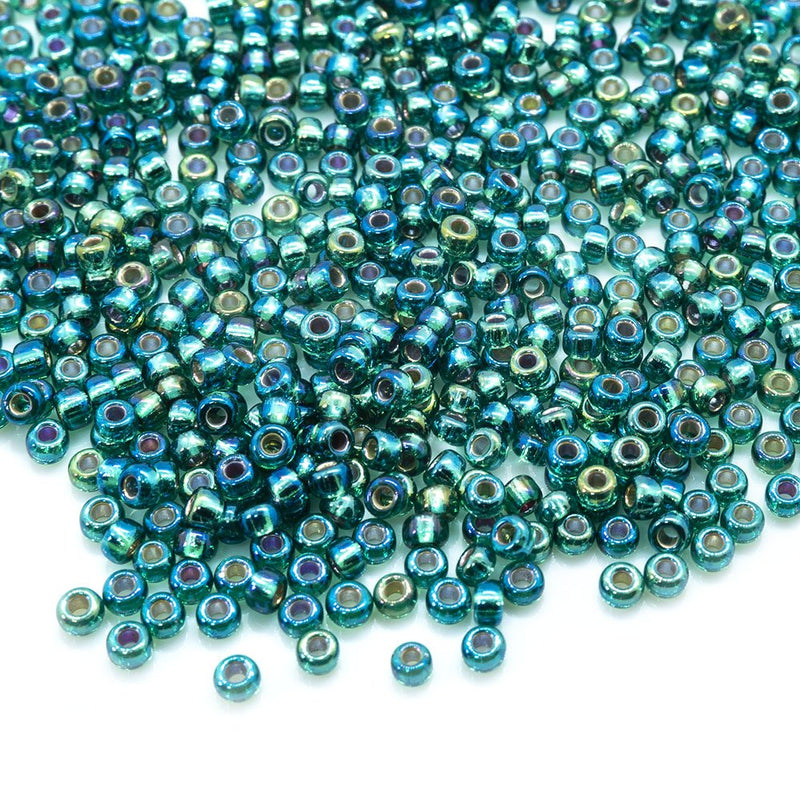 Load image into Gallery viewer, Miyuki Rocailles Silver Lined Seed Beads 11/0 Emerald AB - Affordable Jewellery Supplies
