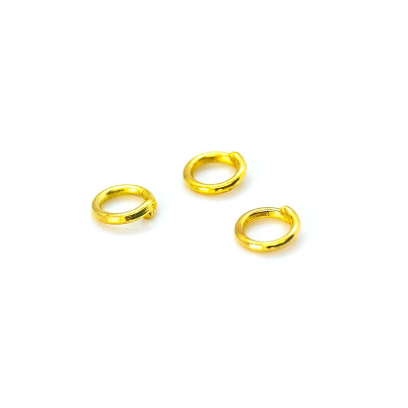 Load image into Gallery viewer, Jump Rings Round 22 Gauge 4mm Gold - Affordable Jewellery Supplies
