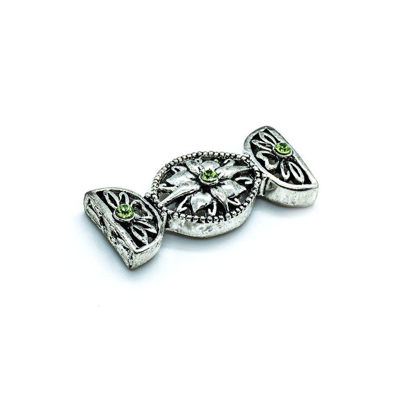Load image into Gallery viewer, Spacer Bar with Swarovski Bow 26mm x 11mm Peridot &amp; silver - Affordable Jewellery Supplies
