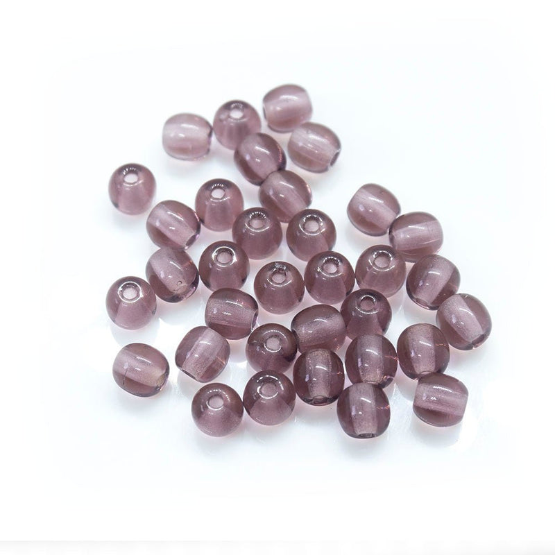 Load image into Gallery viewer, Czech Glass Druk Round 4mm Amethyst - Affordable Jewellery Supplies
