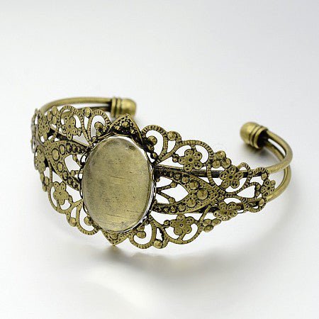 Filigree Brass Cuff Bangle with Oval Transparent Glass Cabochon 5.7cm x 3.6cm Antique Bronze - Affordable Jewellery Supplies