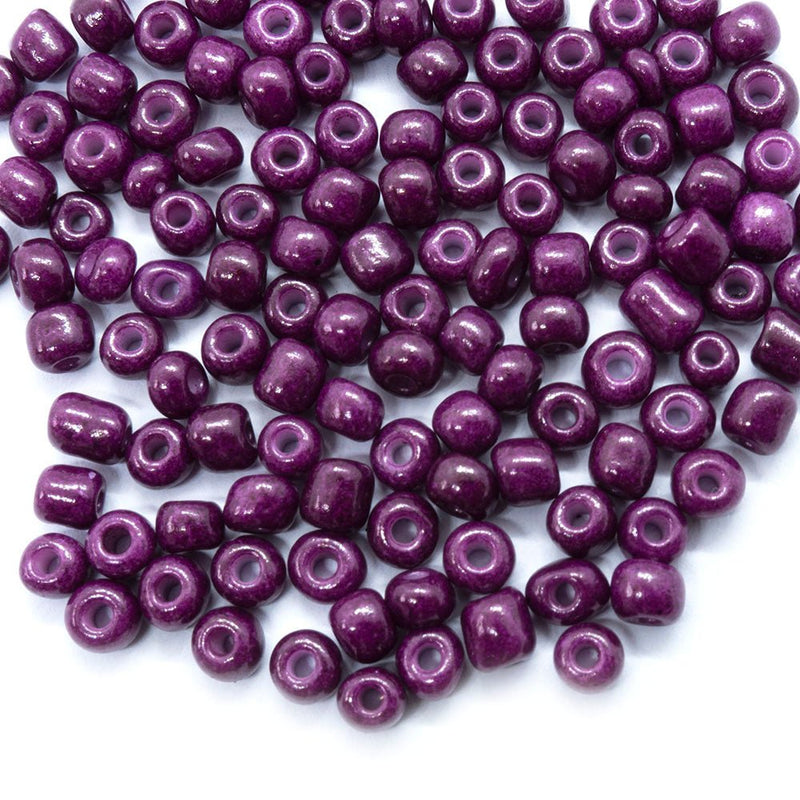 Load image into Gallery viewer, Baking Glass Seed Beads 6/0 4-5mm x3-4mm Medium Violet Red - Affordable Jewellery Supplies
