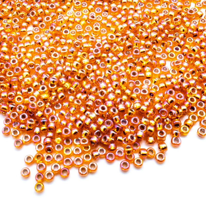 Load image into Gallery viewer, Miyuki Rocailles Silver Lined Seed Beads 11/0 Orange AB - Affordable Jewellery Supplies

