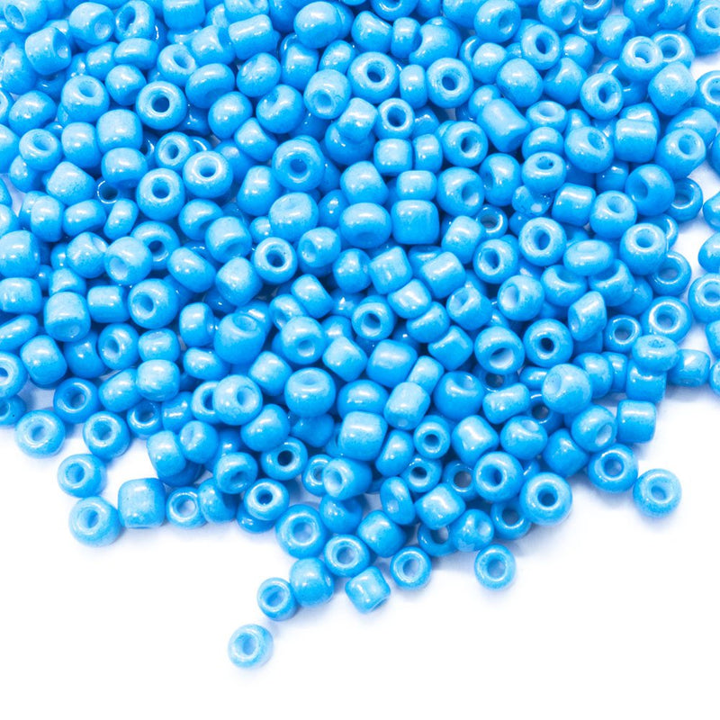 Load image into Gallery viewer, Baking Glass Seed Beads 8/0 3-3.5mm x 2mm Dodger Blue - Affordable Jewellery Supplies
