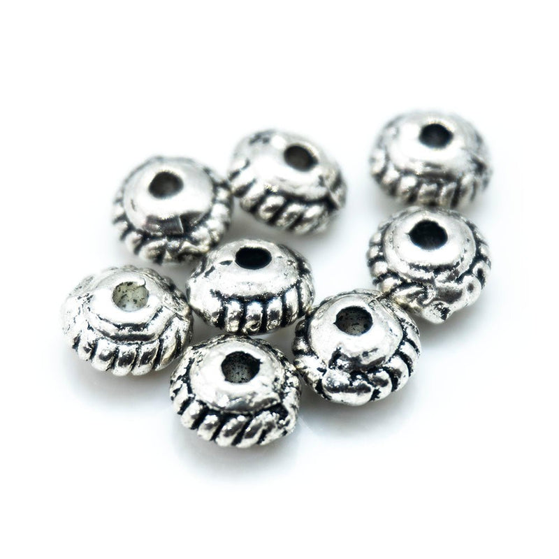 Load image into Gallery viewer, Corrugated Rondelle 4.5mm x 2.5mm Silver - Affordable Jewellery Supplies
