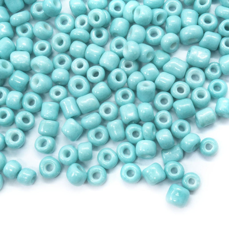 Load image into Gallery viewer, Baking Glass Seed Beads 6/0 4-5mm x3-4mm Cyan - Affordable Jewellery Supplies
