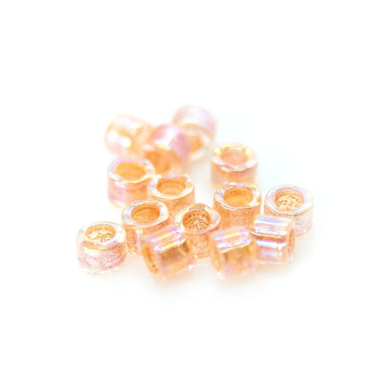 Load image into Gallery viewer, Delica® Seed Beads 11/0 Lined Peach AB (DB0054) - Affordable Jewellery Supplies
