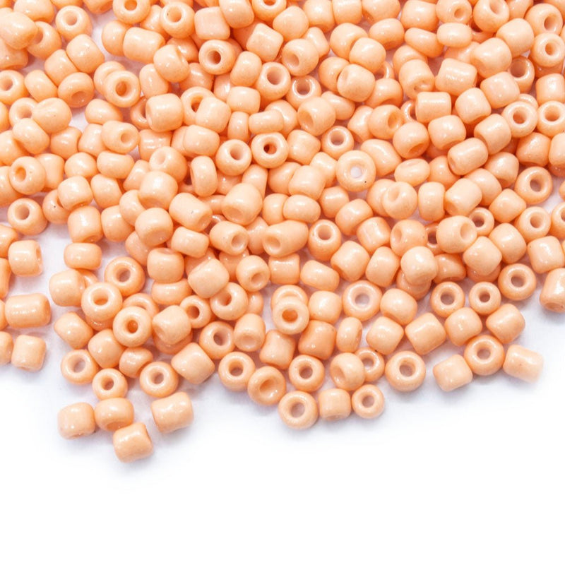 Load image into Gallery viewer, Baking Glass Seed Beads 8/0 3-3.5mm x 2mm Light Salmon - Affordable Jewellery Supplies
